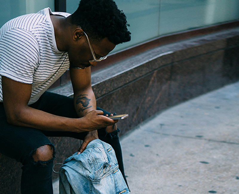 man reading his phone