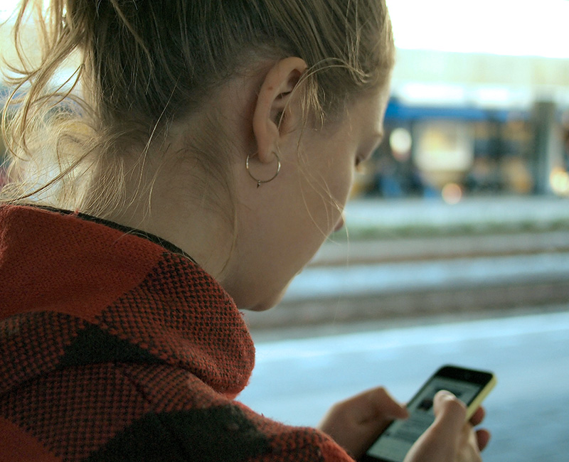 person checking phone for notification
