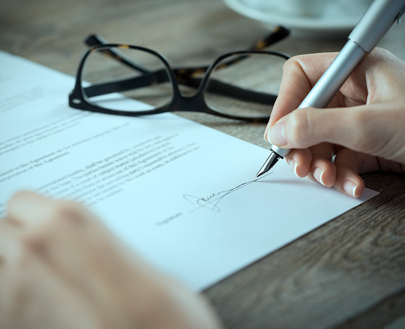 person signing form